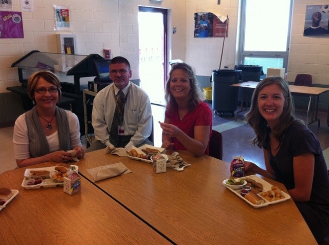 Four adults enjoying Summer Lunch at Denver Public Schools